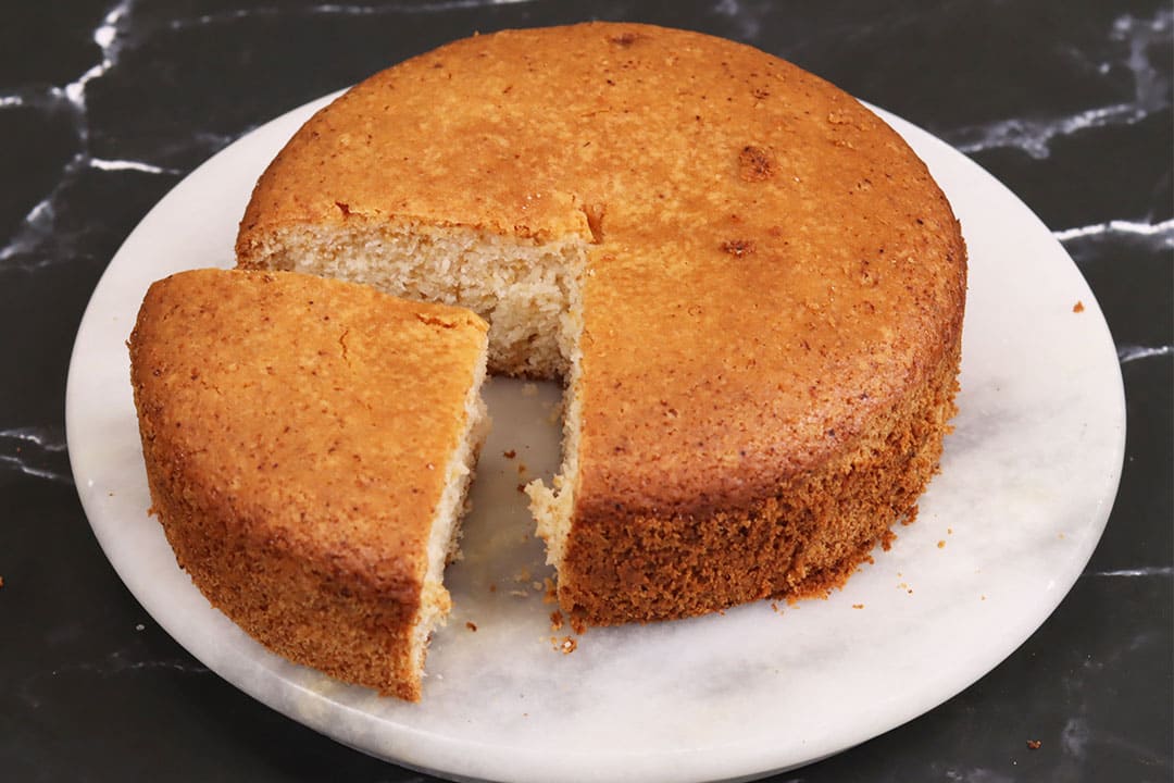 Mixing vanilla cake batter in a bowl